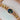 Antique Gold Curb Bracelet with Bicolour Sapphire - East West