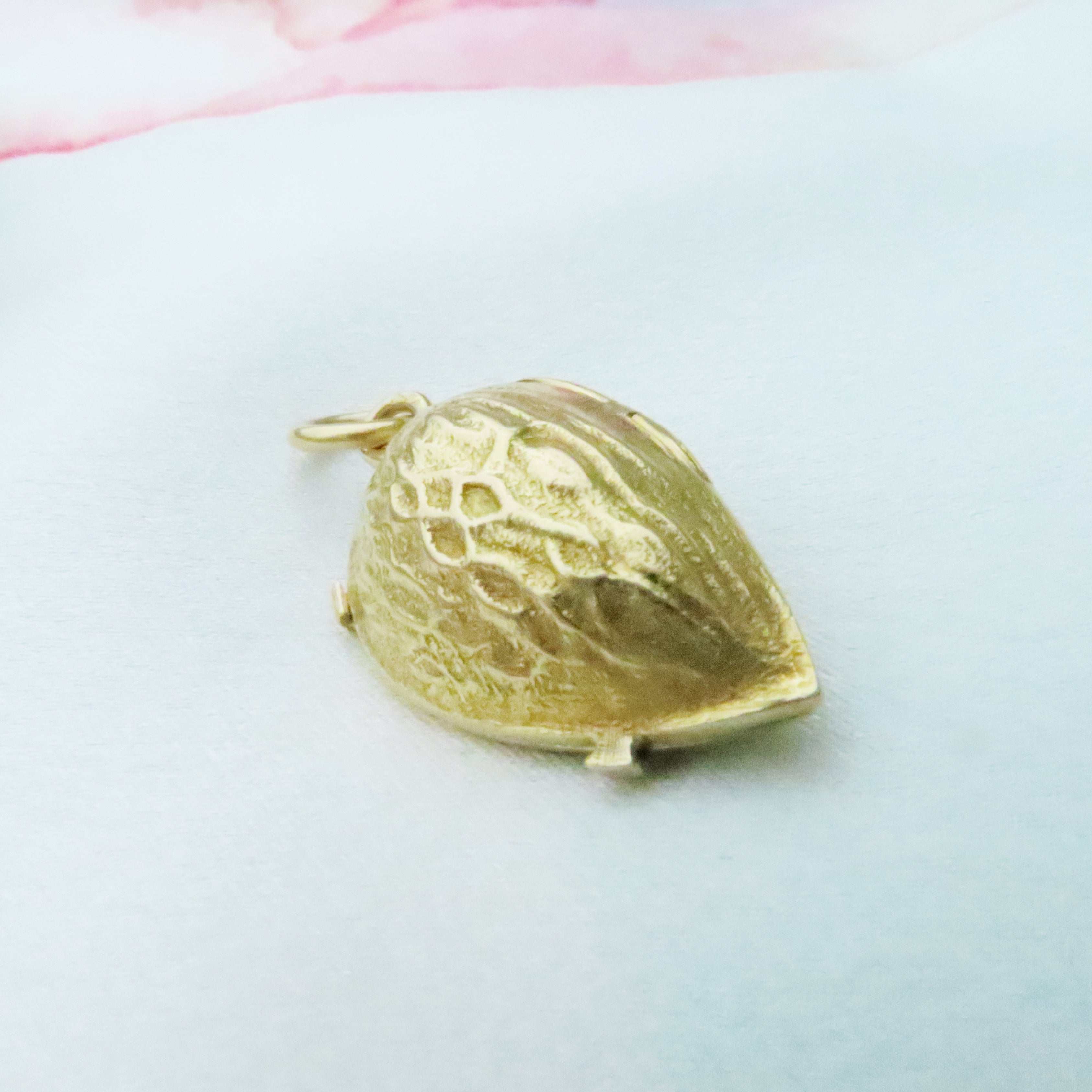 18ct almond pendant / charm with nuts inside