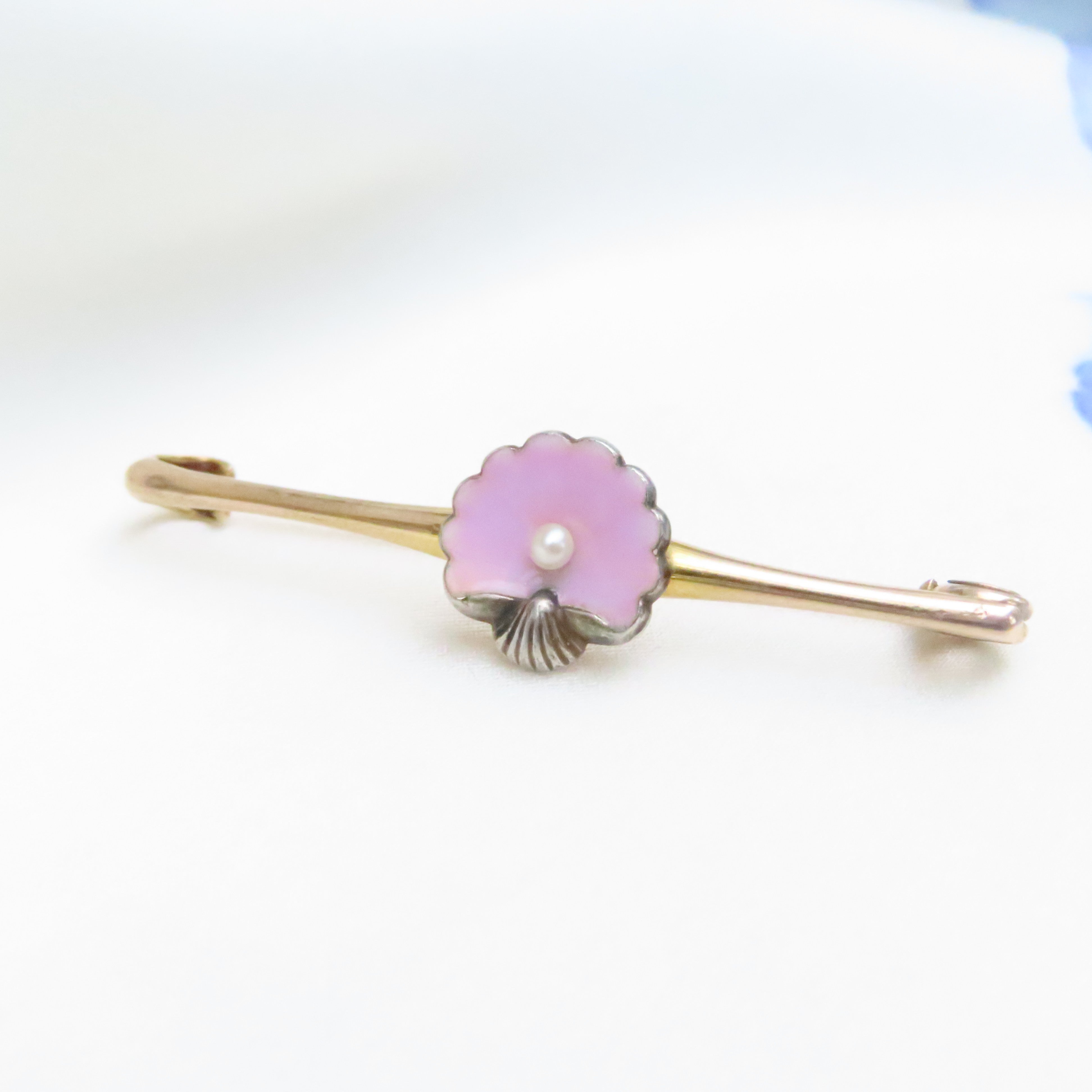 pink enamel shell & a cultured pearl