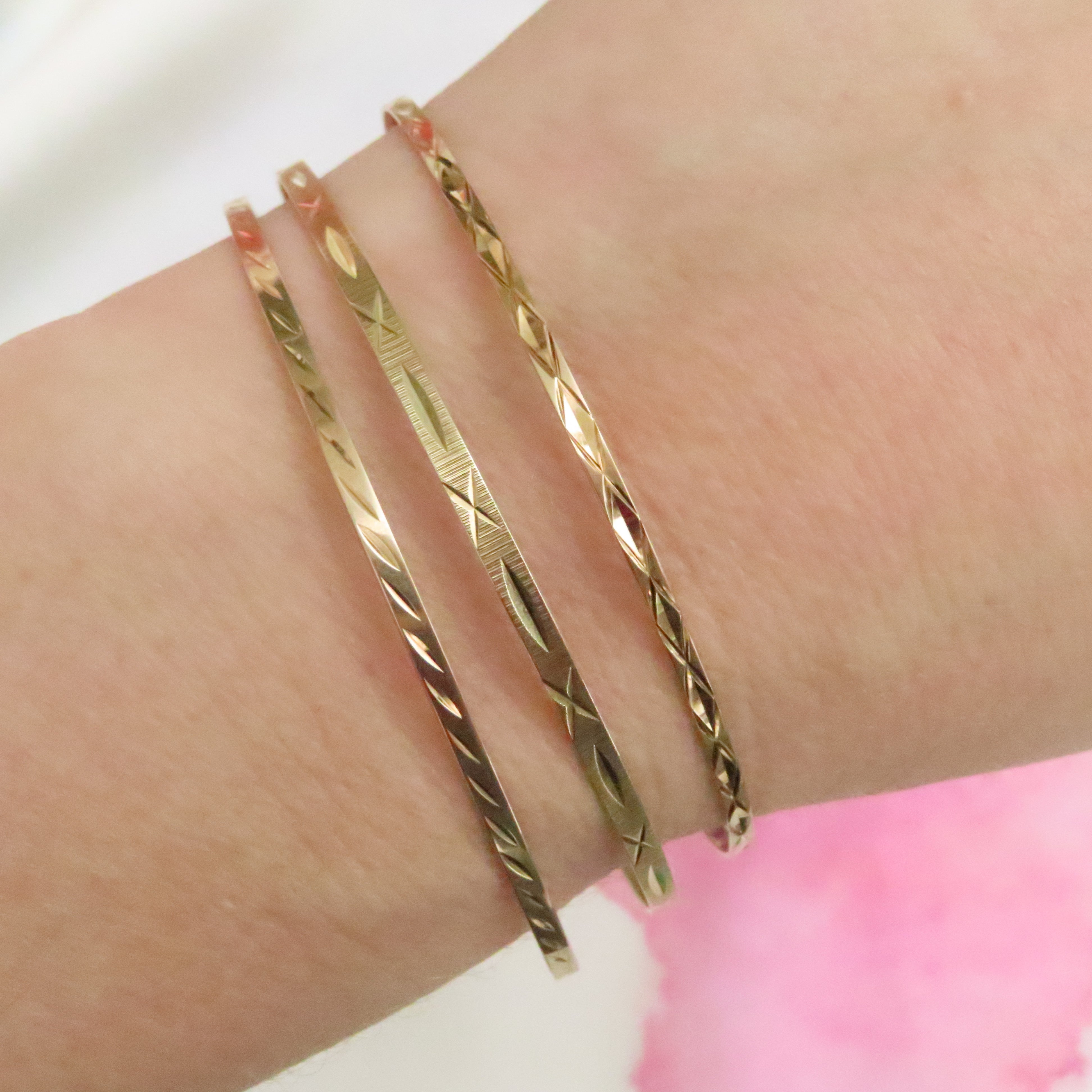 Trio of vintage textured 9ct gold bangles 1988