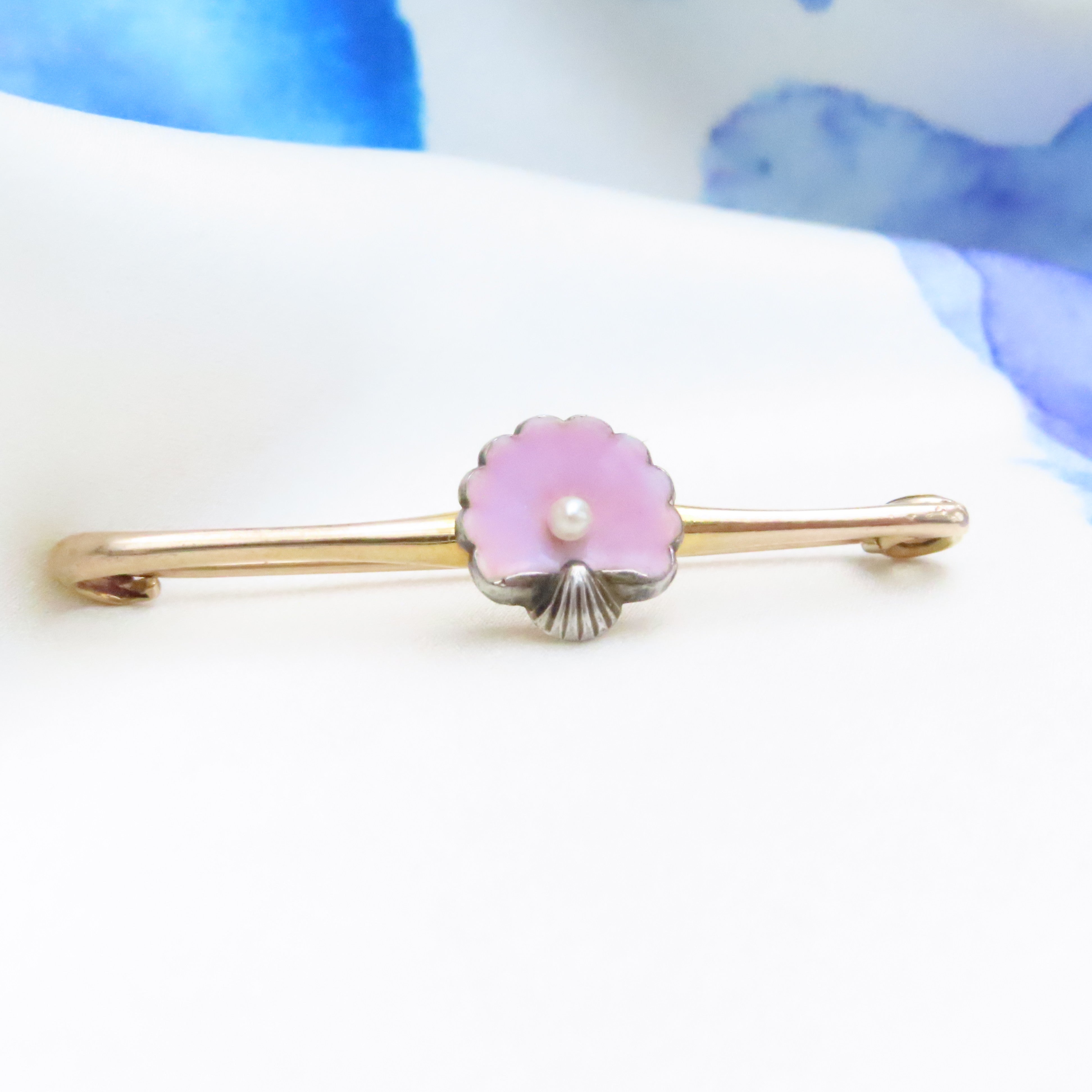 pink enamel shell & a cultured pearl
